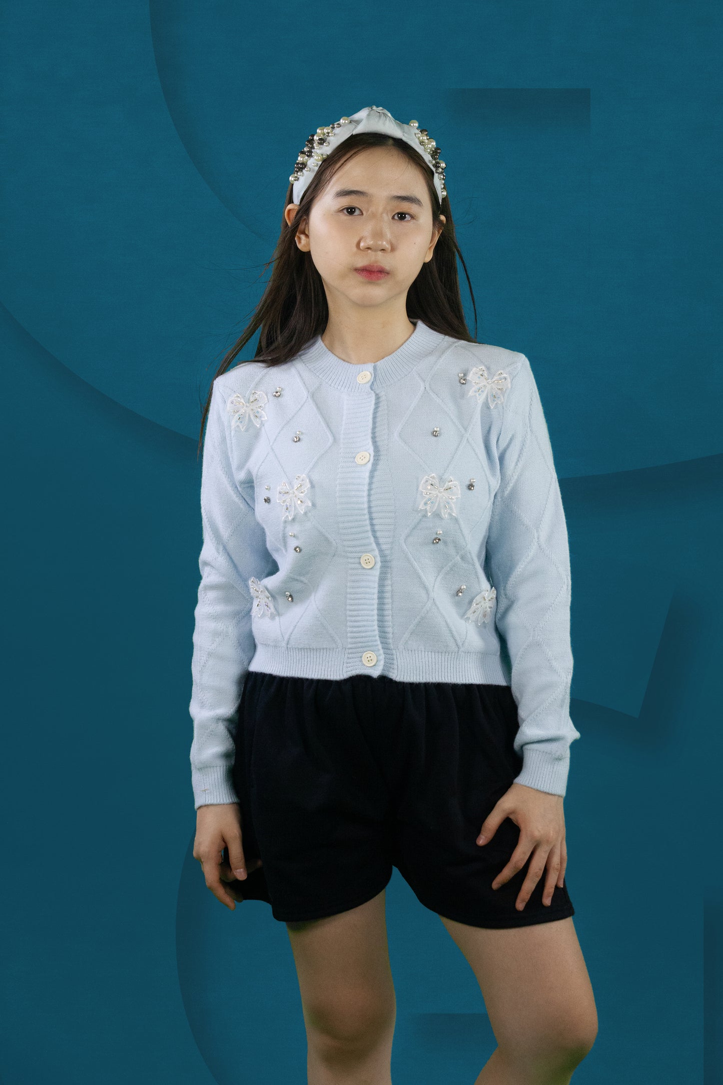 Cardigan Rajut Motif Pita