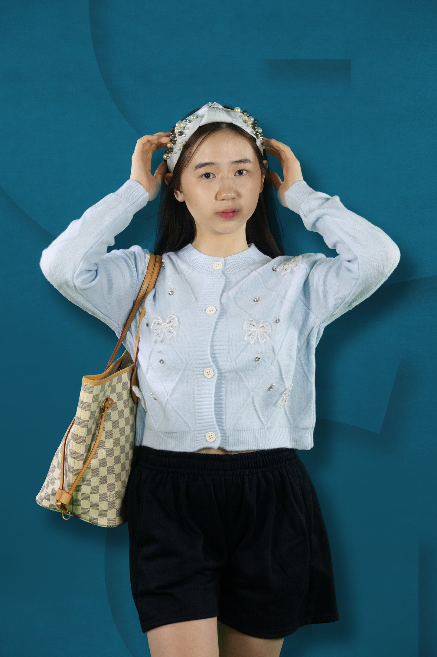 Cardigan Rajut Motif Pita