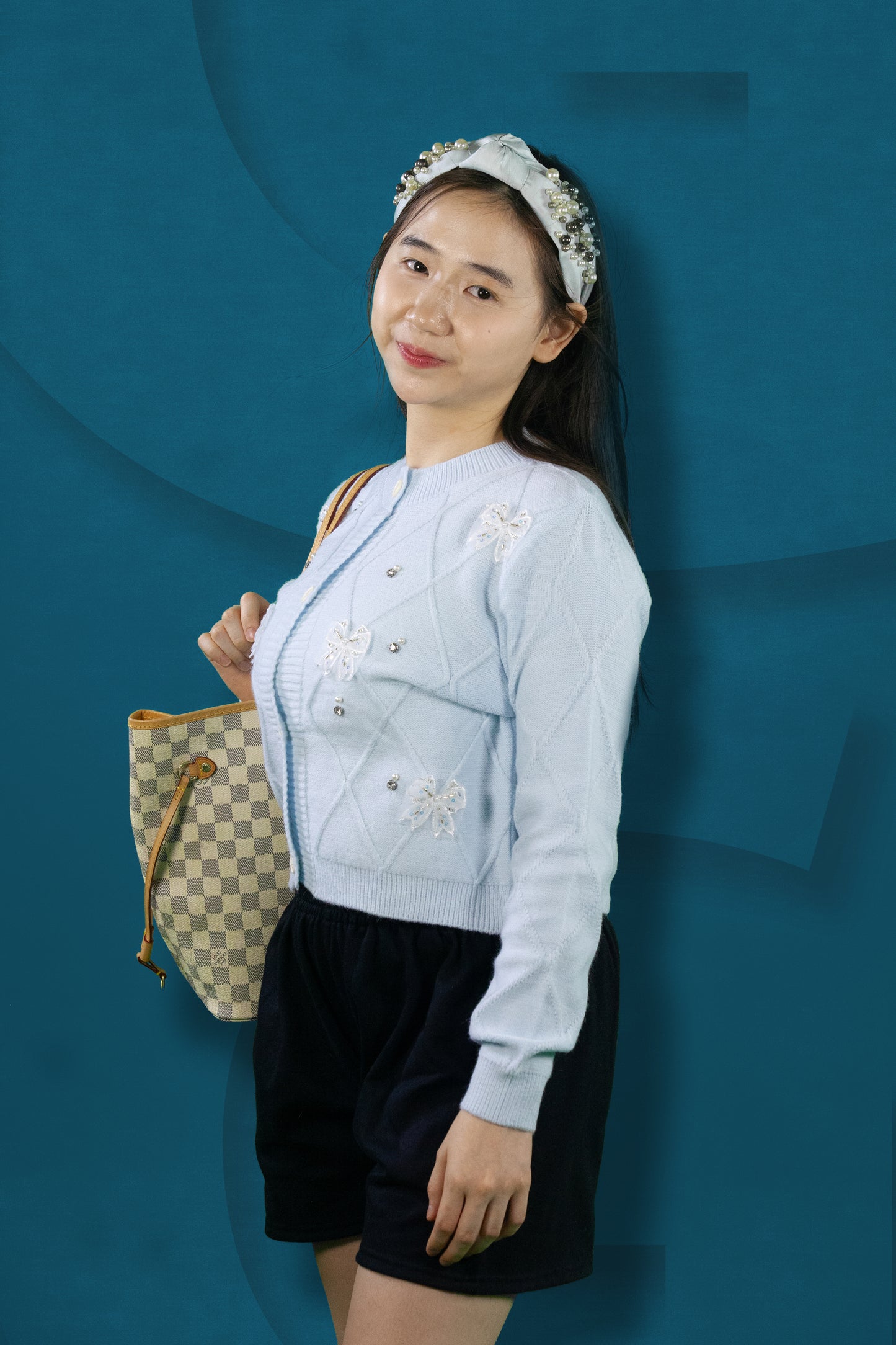 Cardigan Rajut Motif Pita